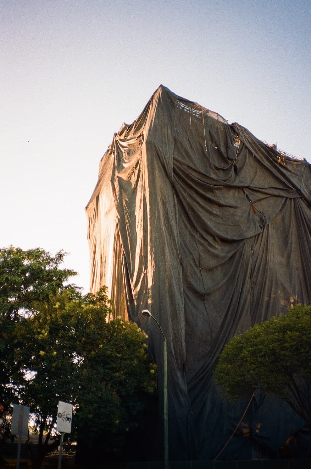 Barthelemy de Mazenod | Architecture | A building under renovation in Mexico City, wearing an artistic cover