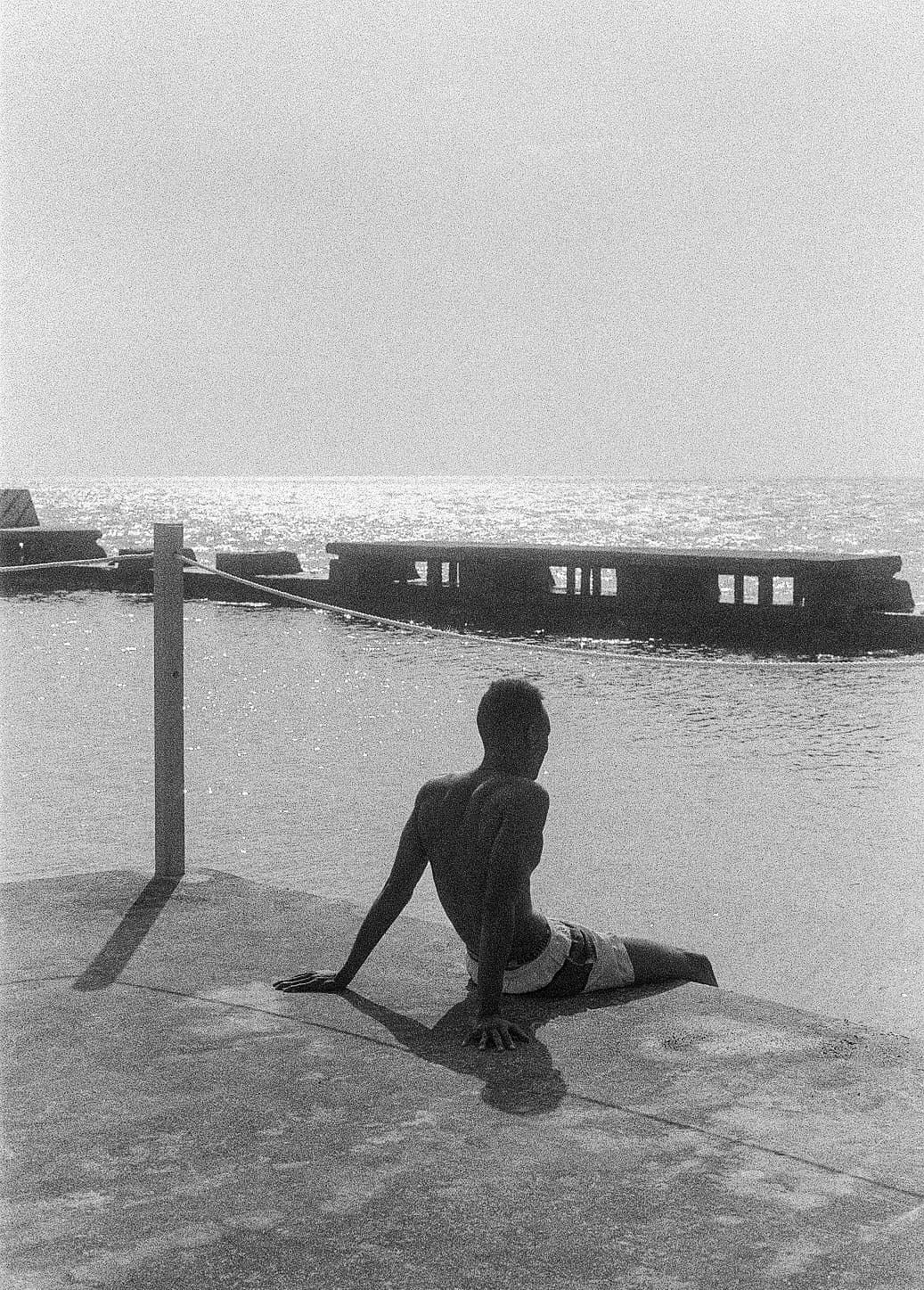 Barthelemy de Mazenod | The Seafront | A man watching the ocean in Cuba