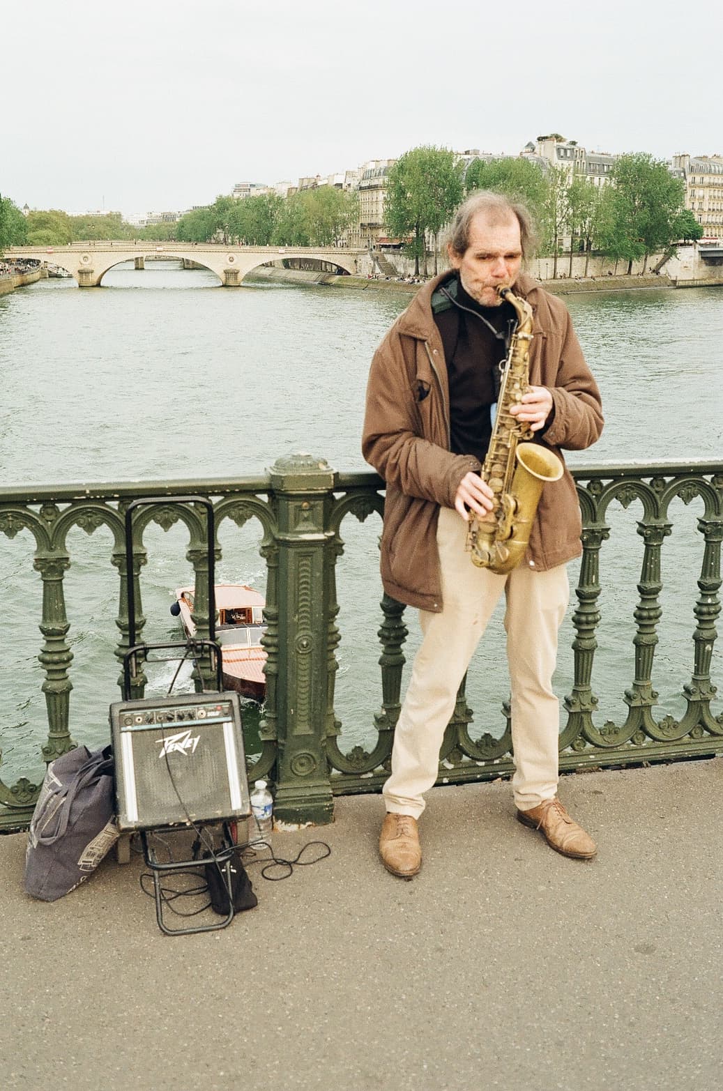 Barthelemy de Mazenod | People of Paris | A man playing the saxophone in front of the Seine